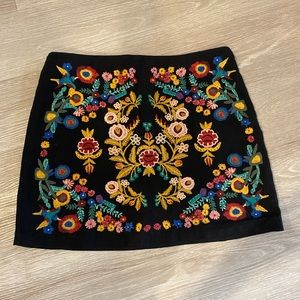 Boutique black skirt with floral print. Size large